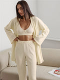 Conjunto de bata y pantalón largo a rayas holgados