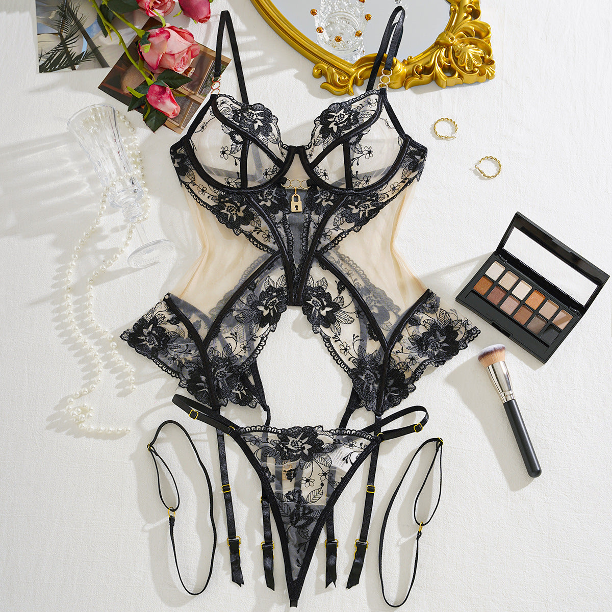 Conjunto de lencería sexy de tres piezas: body de malla con aros, sin espalda y liguero extraíble