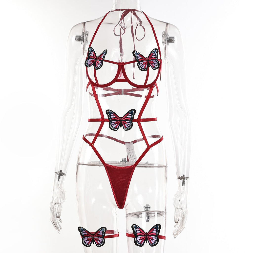 Body erótico de encaje con cuello halter, tirantes, retazos, contraste de colores, lazo y espalda descubierta